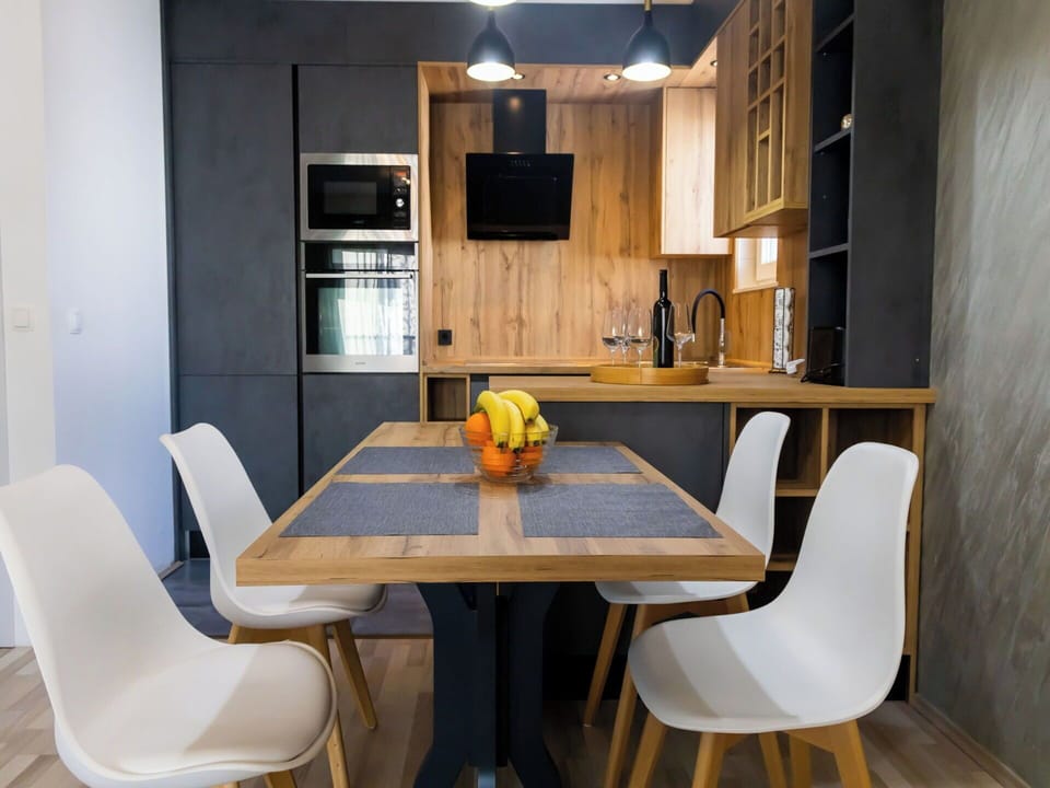 Furniture, Interior Design, Flooring, Wood, Chair, Kitchen & Dining Room Table, Floor, Table, Room, Lighting