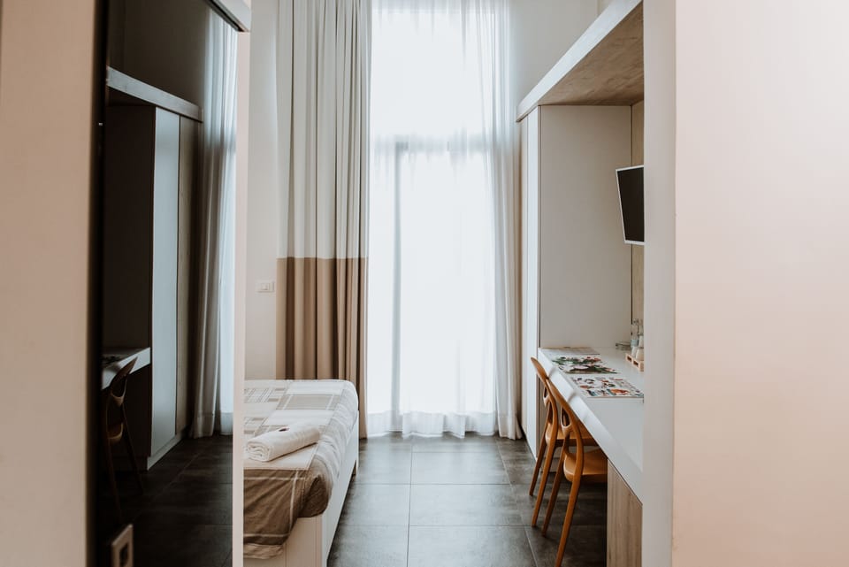 Comfort Triple Room, 1 Queen Bed, Balcony | Minibar, desk, soundproofing, cribs/infant beds