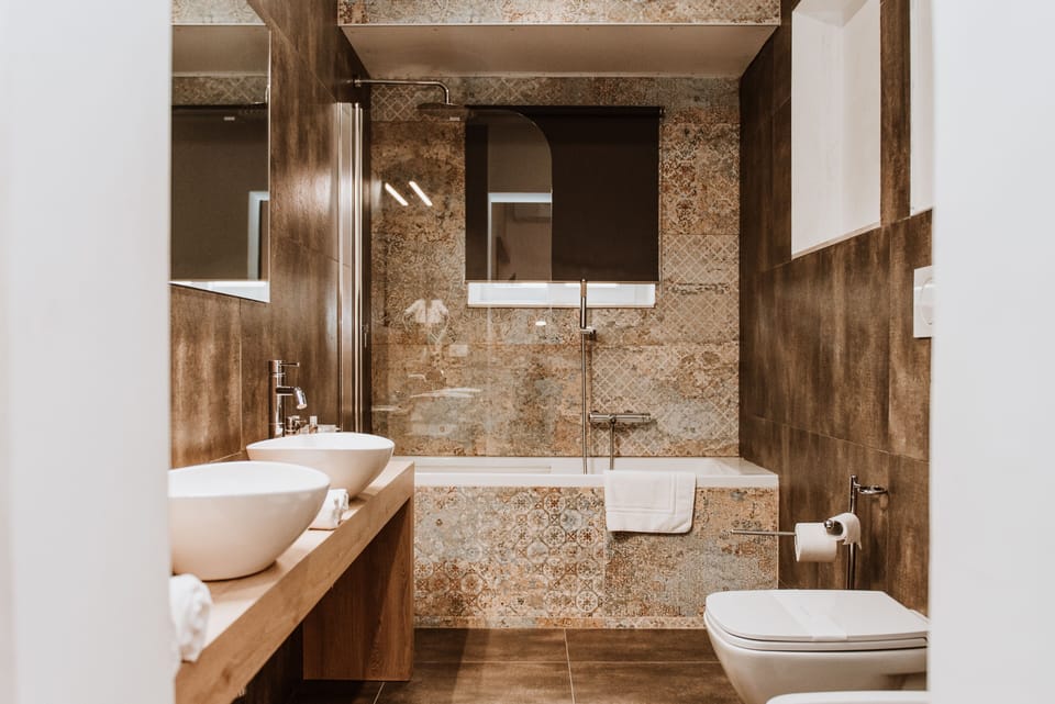 Design Triple Room, 1 Queen Bed, Balcony | Bathroom | Shower, rainfall showerhead, free toiletries, hair dryer