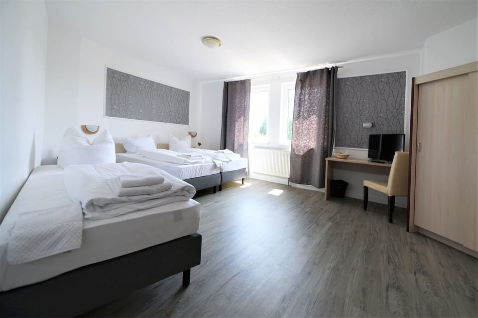 Premium bedding, desk, blackout drapes, iron/ironing board