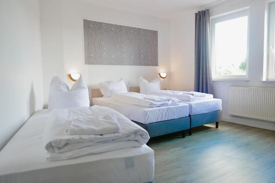 Premium bedding, desk, blackout drapes, iron/ironing board