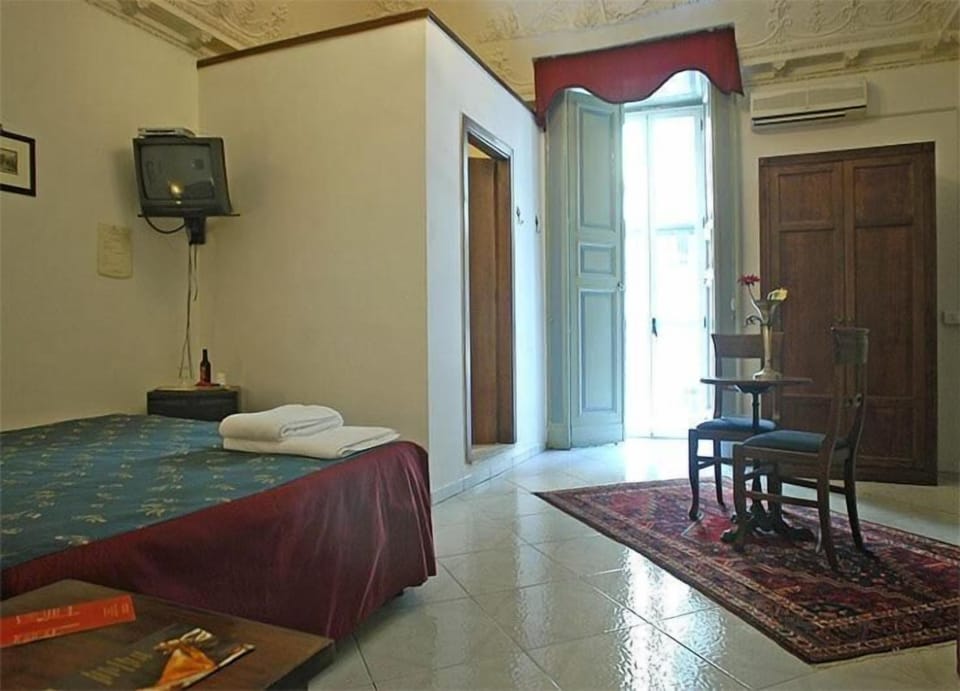 Minibar, laptop workspace, blackout drapes, iron/ironing board