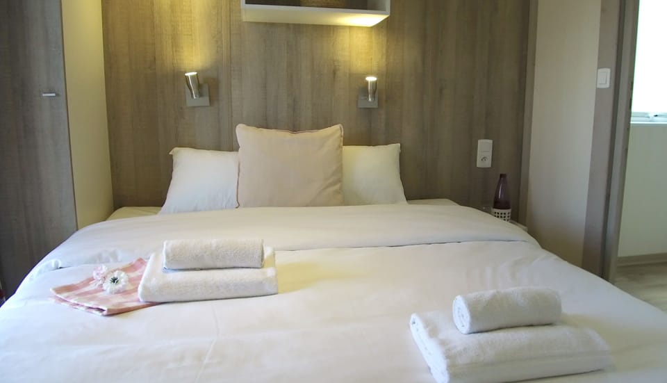 Premium bedding, blackout drapes, soundproofing, bed sheets