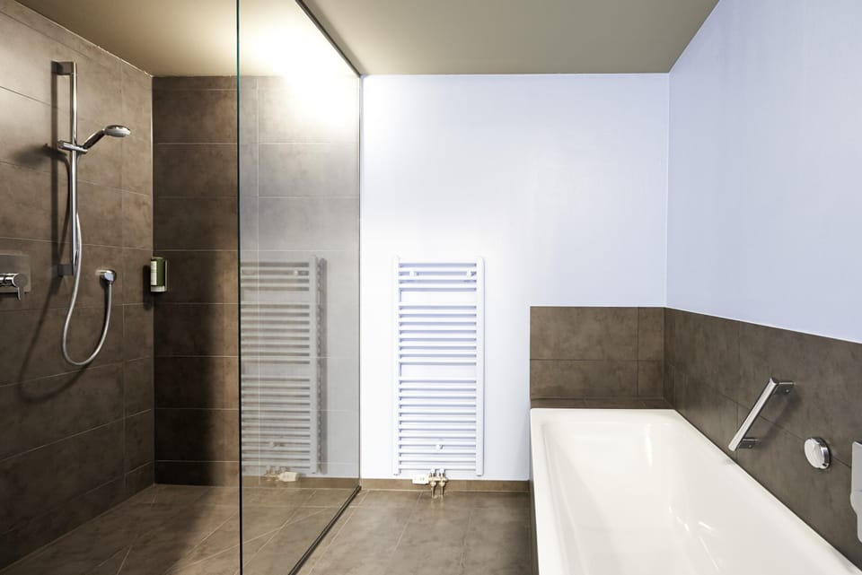 Superior Suite | Bathroom | Free toiletries, hair dryer, bathrobes, slippers