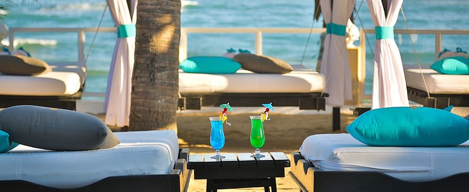 Private beach, free beach shuttle, free beach cabanas, sun loungers