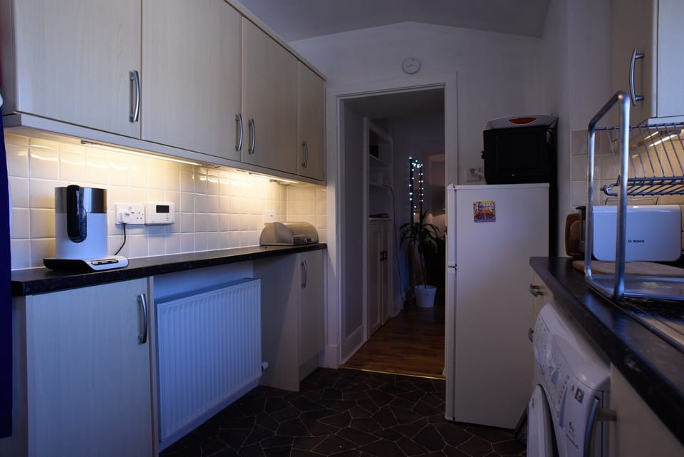 Well equipped kitchen, kettle, microwave, fridge, washing machine etc.