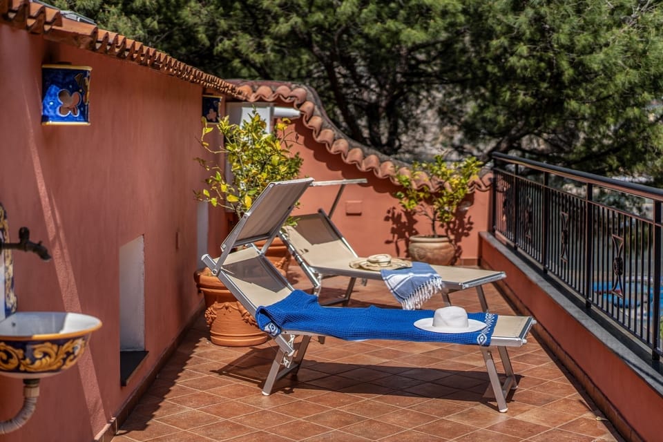 Private terrace. A parasol will be provide during your stay
