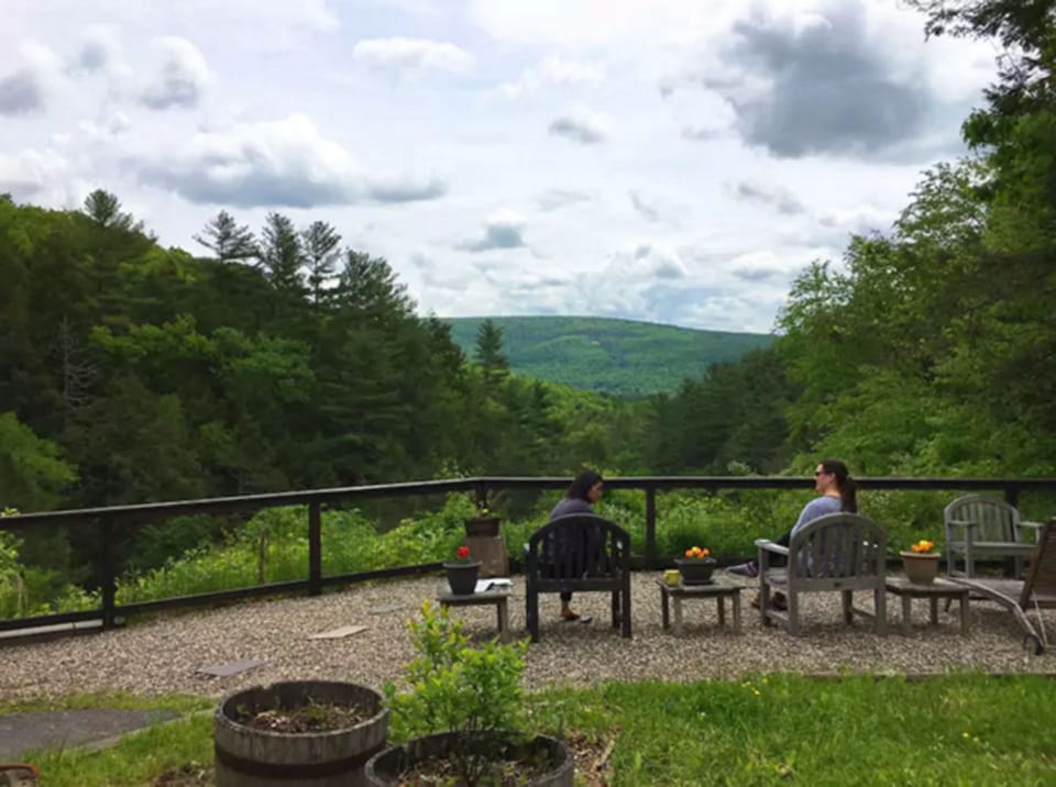 Sit outside, chatting with friends while enjoying uspoiled mountain views.