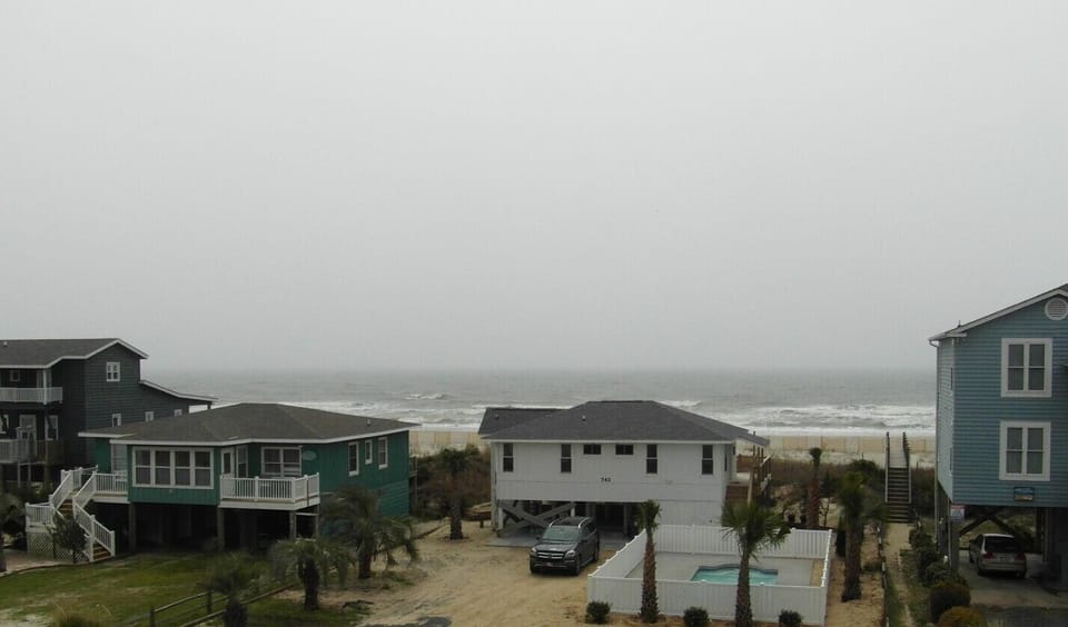 Front balcony ocean view. **Beach access directly across the street.
