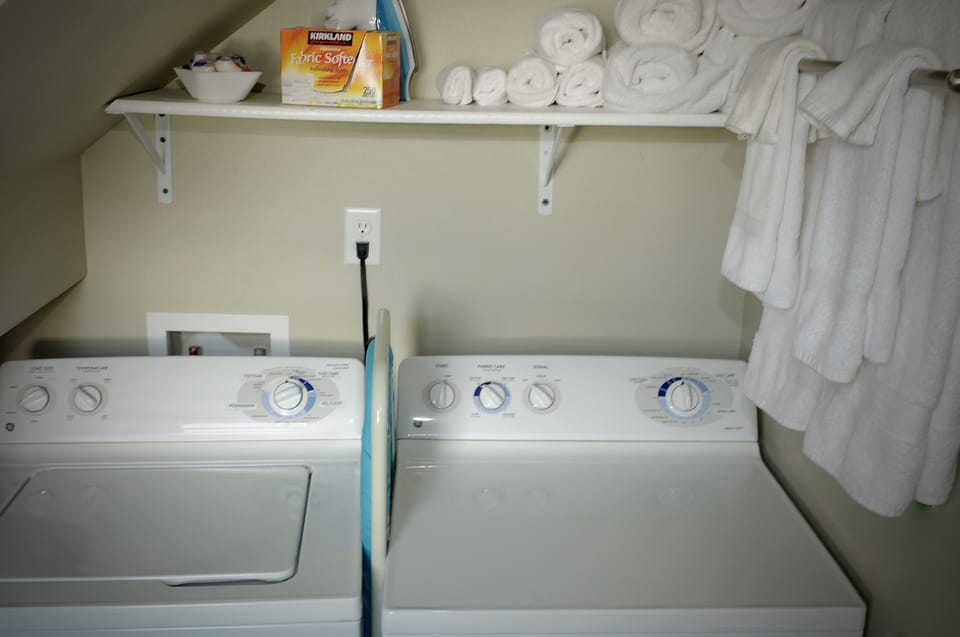 Full size washer and dryer in bathroom