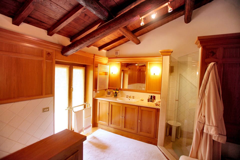 Deep soaking tub, rainfall showerhead, hair dryer, bidet