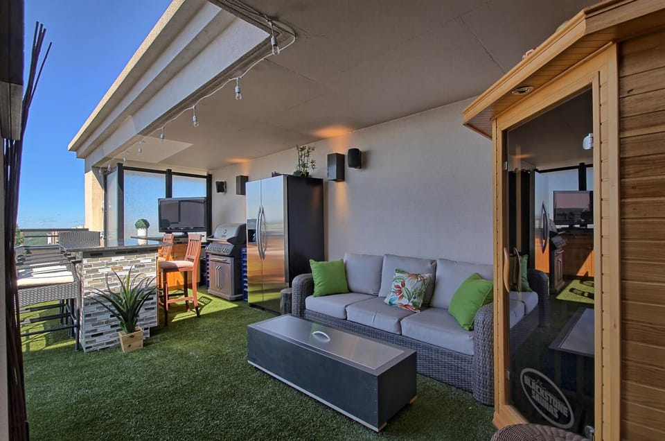 Your outdoor oasis awaits! 4-person sauna, 8-person hot tub, BBQ, bar and more!