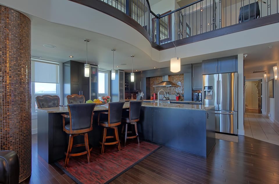 The kitchen is a chef's dream with all modern appliances and fittings...