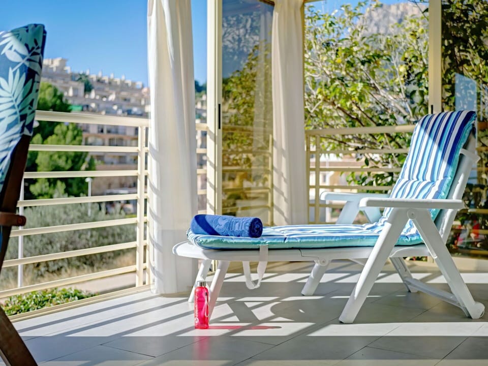 Property, Furniture, Sky, Blue, Azure, Wood, Shade, Interior Design, Outdoor Furniture, Architecture