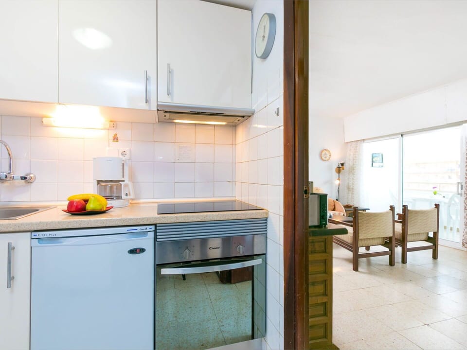 Room, Kitchen, Property, Furniture, Countertop, Cabinetry, Yellow, Interior Design, House, Building