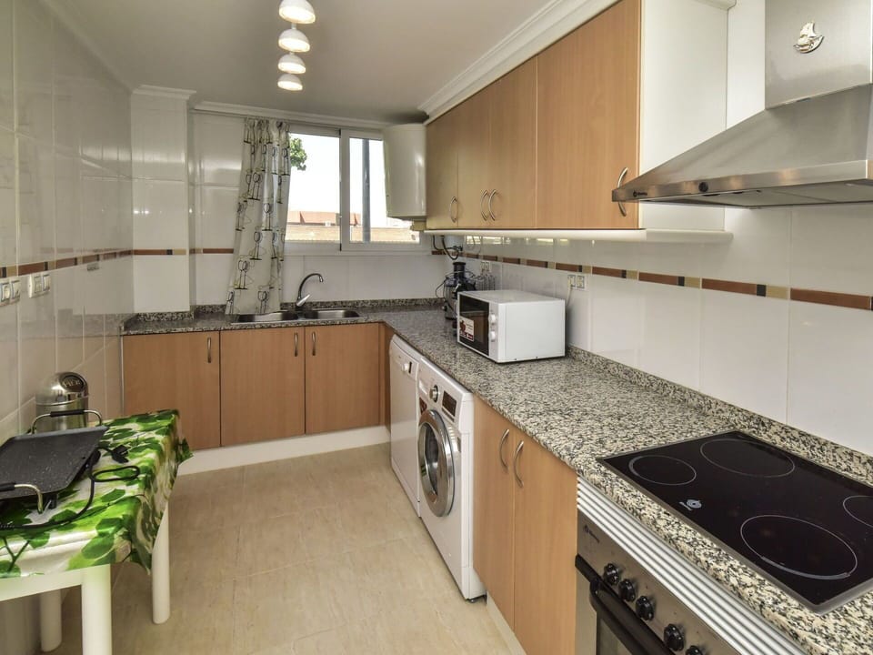 Countertop, Property, Room, Kitchen, Cabinetry, Furniture, Building, Interior Design, House, Floor