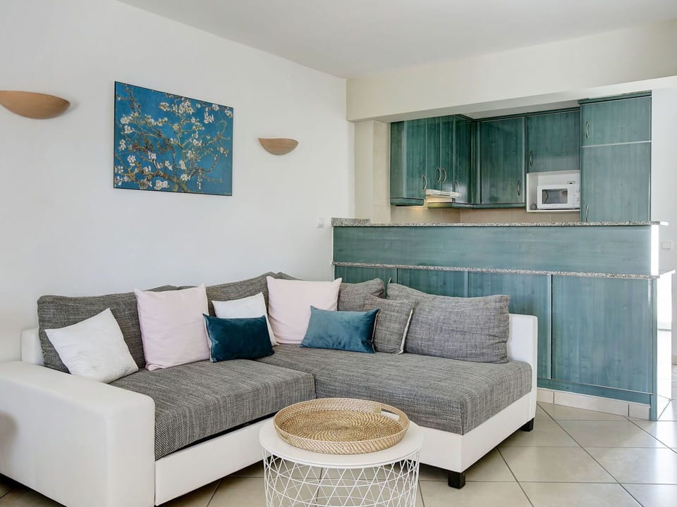 Living Room, Furniture, Room, Interior Design, Property, Blue, Couch, Turquoise, Wall, Table