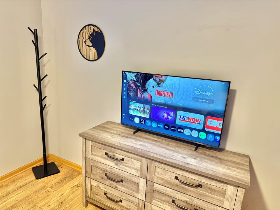 Bedroom 1- 43" Smart TV & Six Drawer Dresser