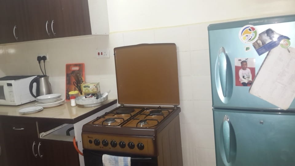 Kitchen fitted with all cooking appliance.