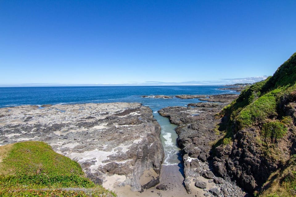 The house sits on a bluff where you can watch the tides ebb and flow through this canal.