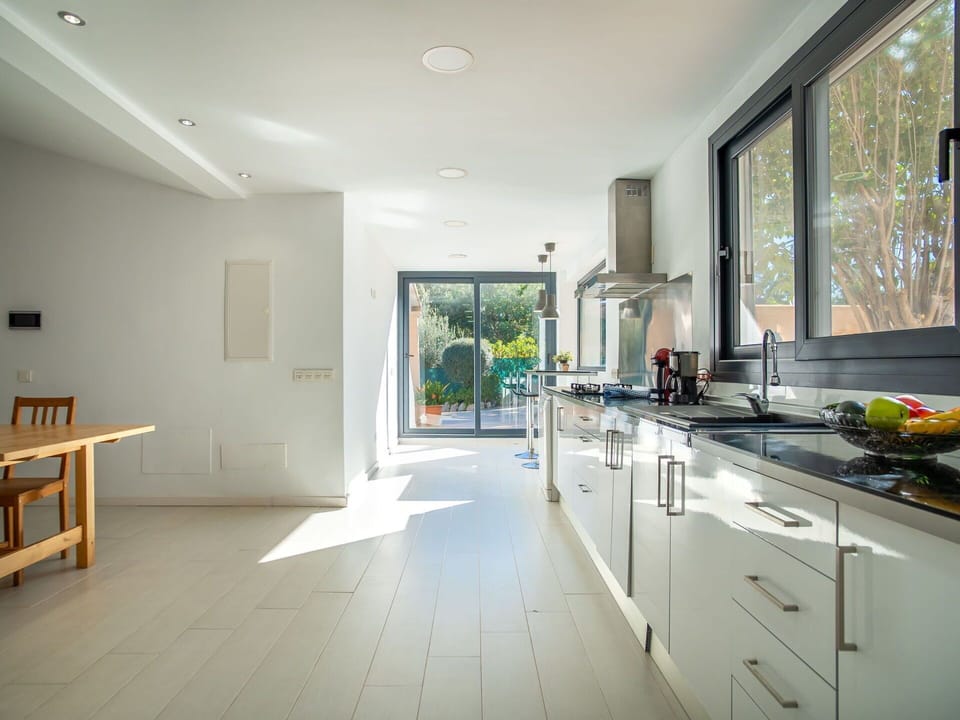 Cabinetry, Plant, Property, Furniture, Kitchen Sink, Window, Sink, Countertop, Tap, Building