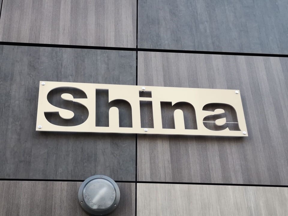 Wood, Font, Facade, Metal, Signage, Rectangle, Pattern, Gas