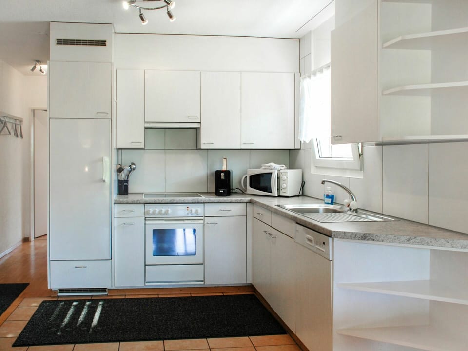 Cabinetry, Kitchen Sink, Countertop, Property, Sink, Building, Kitchen Appliance, Kitchen Stove, Kitchen, Home Appliance