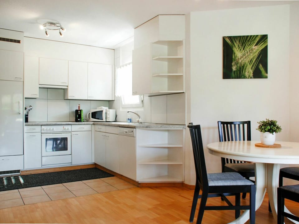 Cabinetry, Countertop, Furniture, Table, Kitchen Stove, Kitchen Appliance, Wood, Interior Design, Chair
