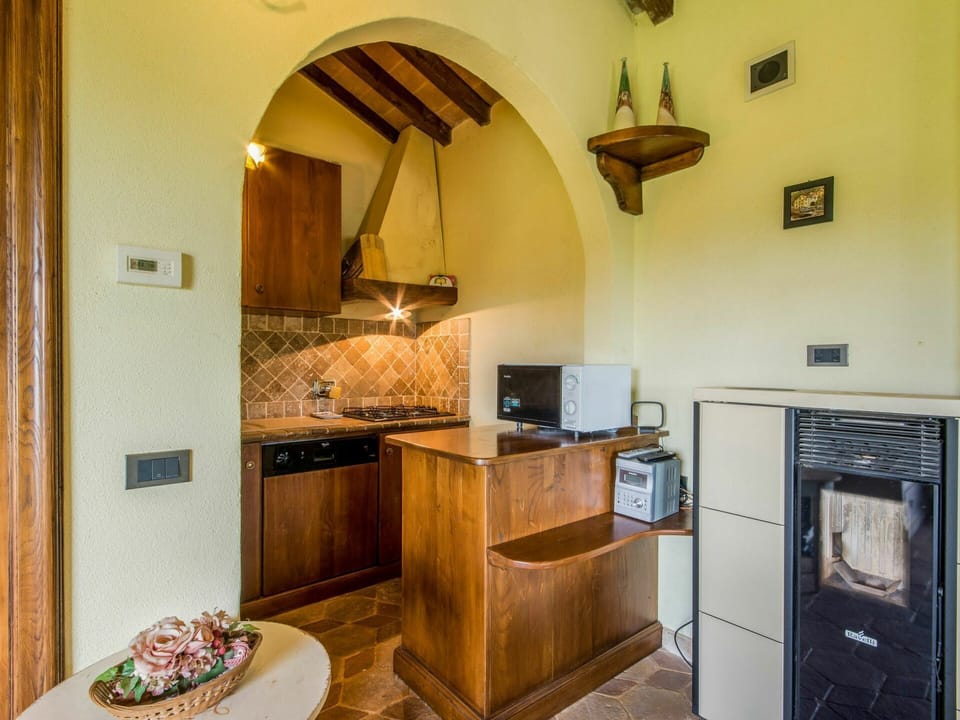 Cabinetry, Property, Furniture, Television, Wood, Countertop, Interior Design, Kitchen Appliance, Comfort, Living Room