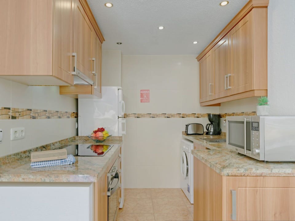 Cabinetry, Property, Countertop, Building, Kitchen Appliance, Kitchen Stove, Kitchen, Interior Design, Wood, Drawer