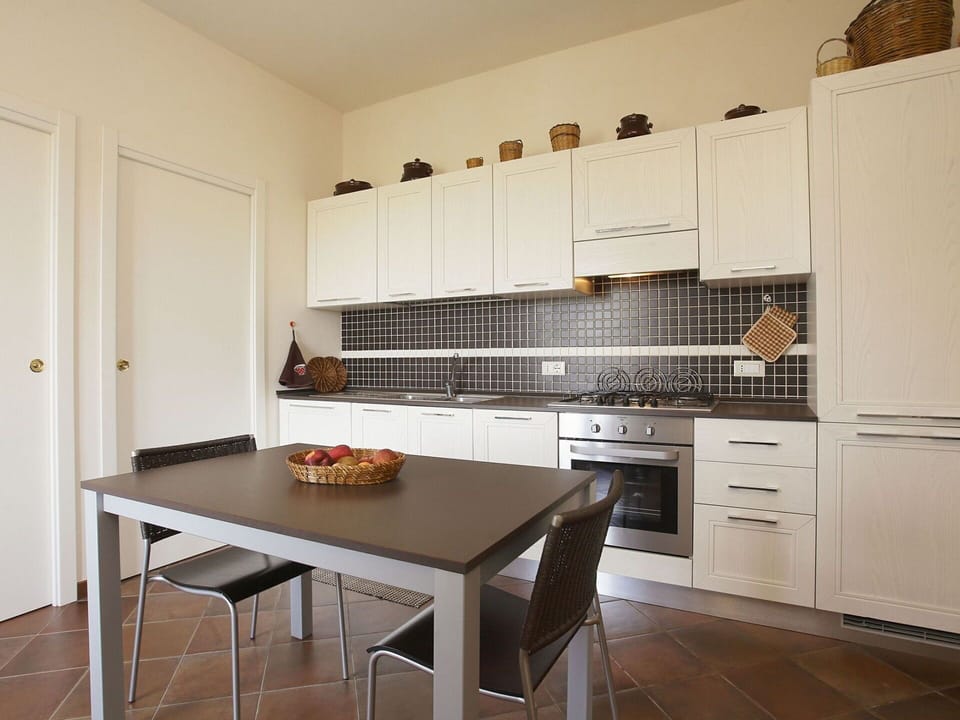 Furniture, Room, Property, Kitchen, Countertop, Cabinetry, Interior Design, Kitchen Stove, Building, Floor