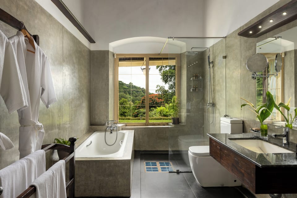 Simpson's Bungalow Room- Mountain View | Bathroom | Shower, rainfall showerhead, eco-friendly toiletries, hair dryer