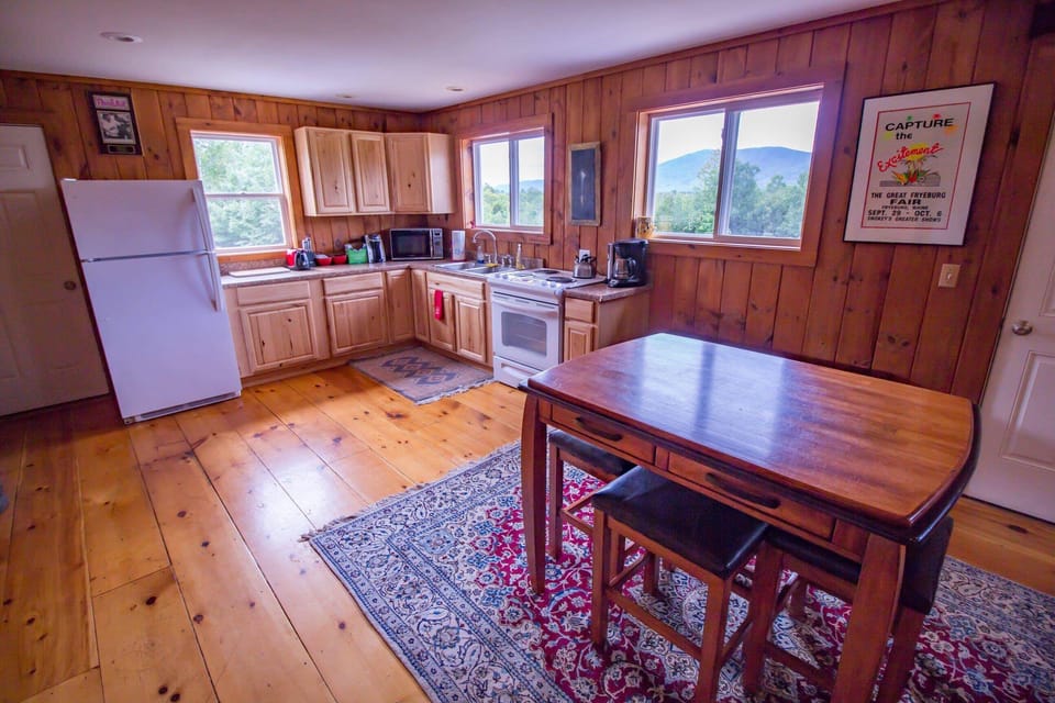 Full fridge, oven, coffee maker, silverware, glassware, cookware, great views