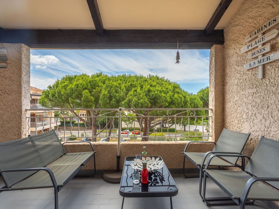 Property, Furniture, Sky, Table, Shade, Interior Design, Floor, Chair, Outdoor Furniture, Plant