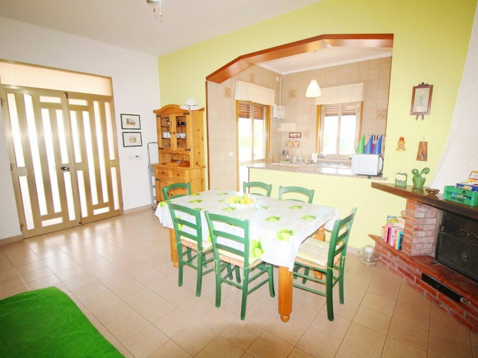 Furniture, Table, Property, Green, Chair, Wood, Interior Design, Cabinetry, Flooring, Floor