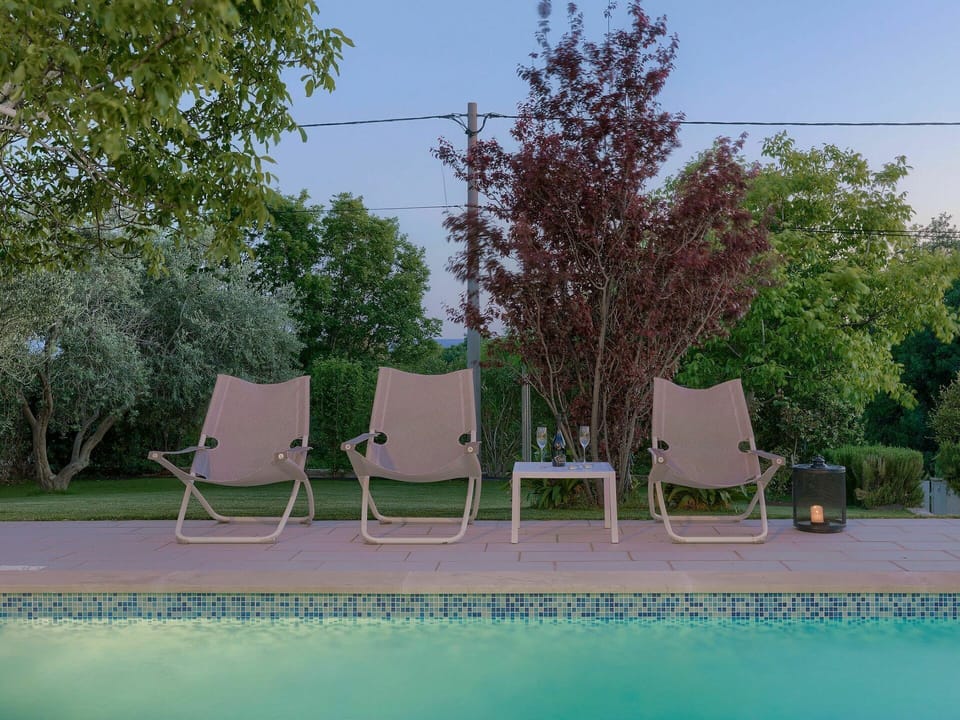 Water, Sky, Furniture, Plant, Tree, Outdoor Furniture, Shade, Chair, Natural Landscape, Rectangle