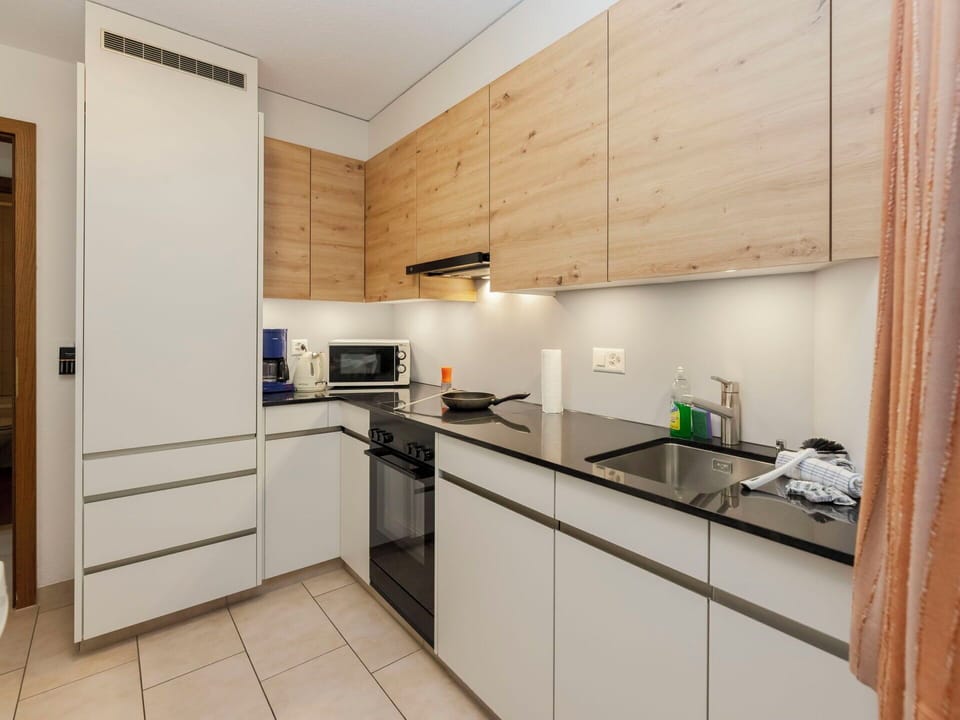Kitchen, Countertop, Kitchen Appliance, Cabinetry, Interior Design, Furniture, Flooring, Wood, Major Appliance, Floor