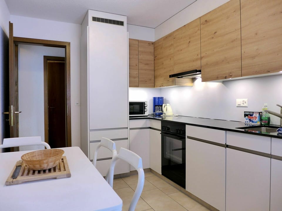 Cabinetry, Furniture, Table, Countertop, Wood, Kitchen Appliance, Kitchen, Kitchen Sink, Interior Design, Building