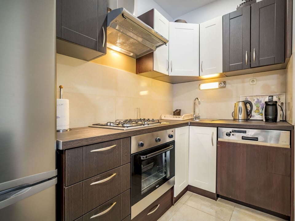 Countertop, Cabinetry, Kitchen, Room, Property, Furniture, Interior Design, Major Appliance, Yellow, Building