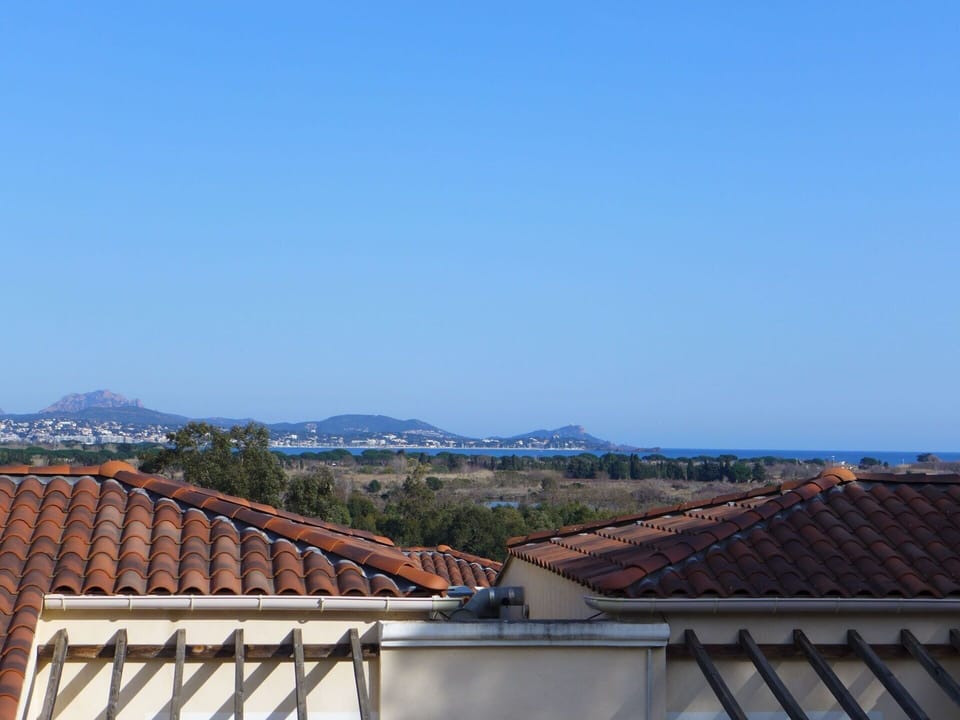 Roof, Sky, Property, Town, Architecture, Vacation, Real Estate, House, Tree, Building