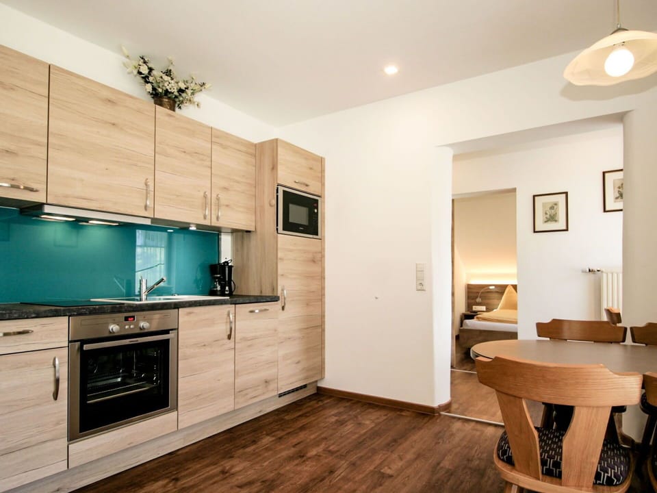 Room, Furniture, Property, Interior Design, Building, Cabinetry, Wood Flooring, Floor, Ceiling, House
