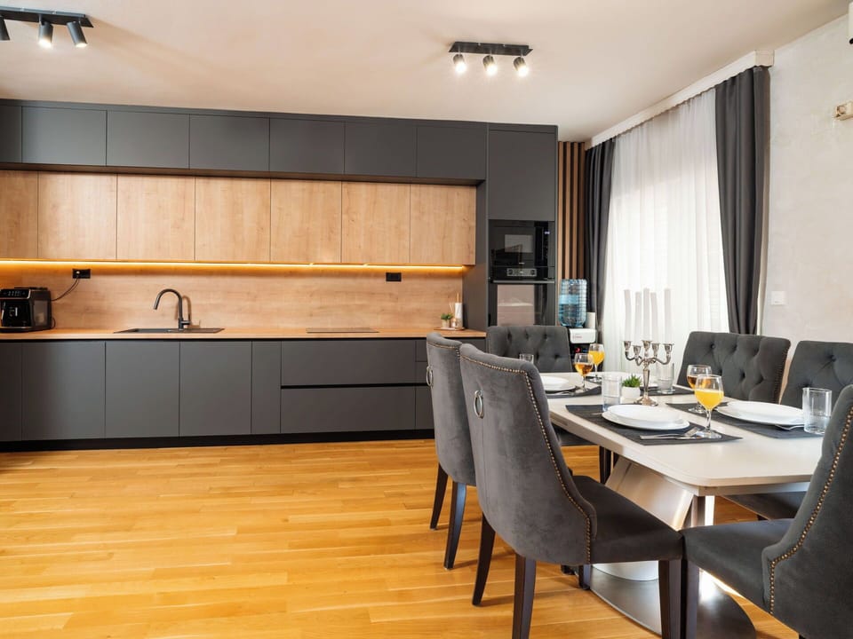 Furniture, Interior Design, Flooring, Wood, Kitchen, Countertop, Cabinetry, Floor, Home, Light Fixture