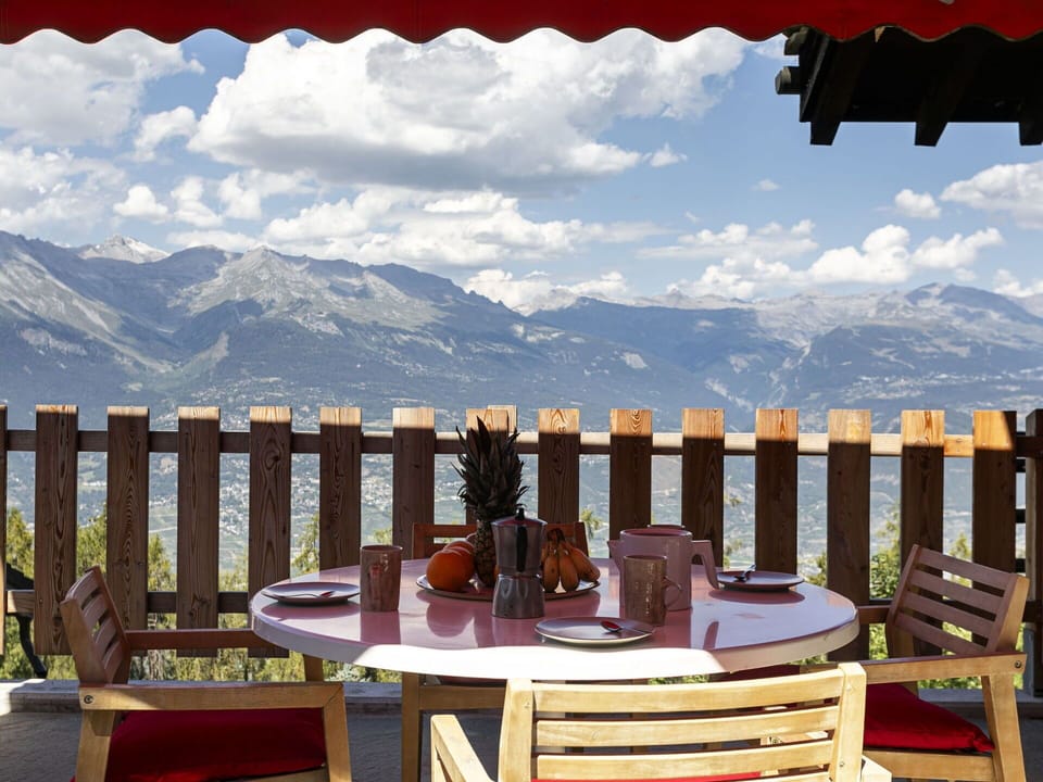Sky, Cloud, Table, Furniture, Property, Mountain, Chair, Light, Nature, Wood