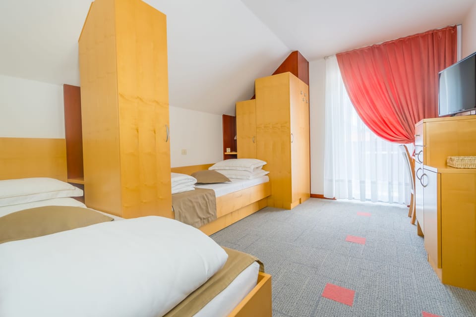 Twin Room, Balcony | Minibar, in-room safe, desk, blackout drapes