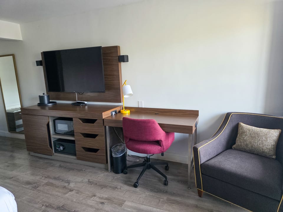Suite, King Bed w/ Sofabed | Premium bedding, down comforters, blackout drapes, free WiFi