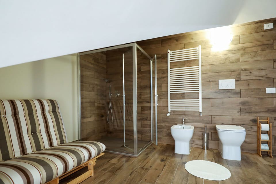 Family Studio | Bathroom | Shower, free toiletries, bathrobes, bidet