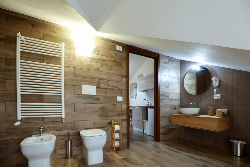 Family Studio | Bathroom | Shower, free toiletries, bathrobes, bidet
