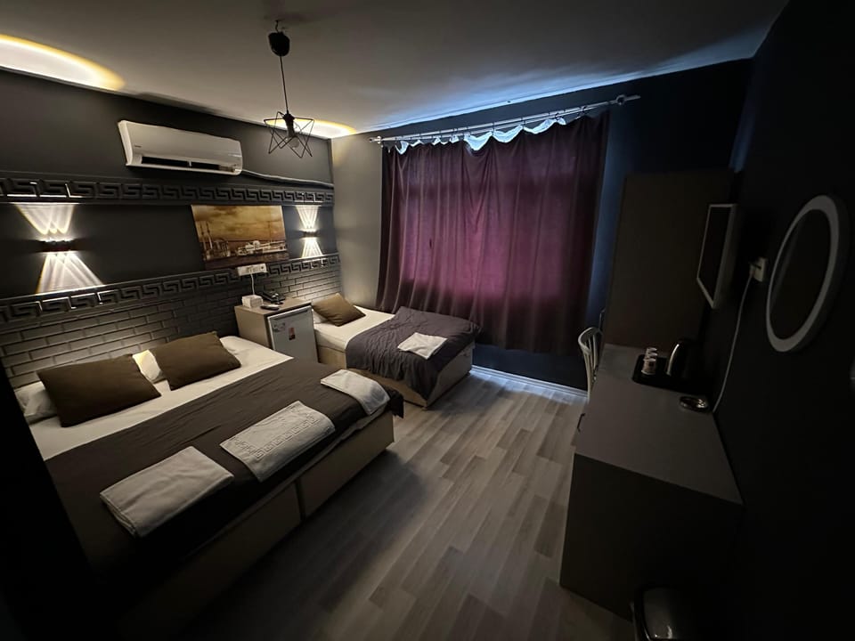 Triple Room | Minibar, blackout drapes, soundproofing, WiFi (free)