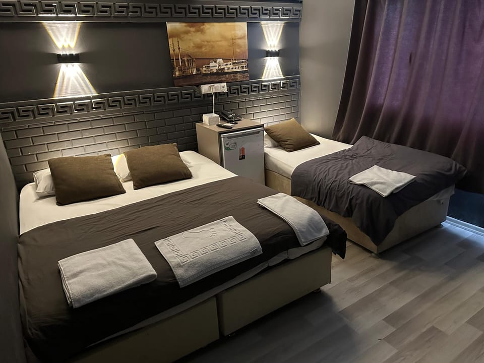 Triple Room | Minibar, blackout drapes, soundproofing, WiFi (free)