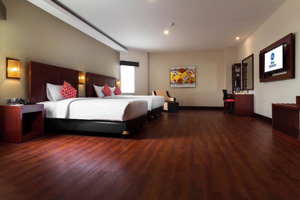 Family Room, Multiple Beds, Non Smoking, No Windows | In-room safe, desk, laptop workspace, iron/ironing board